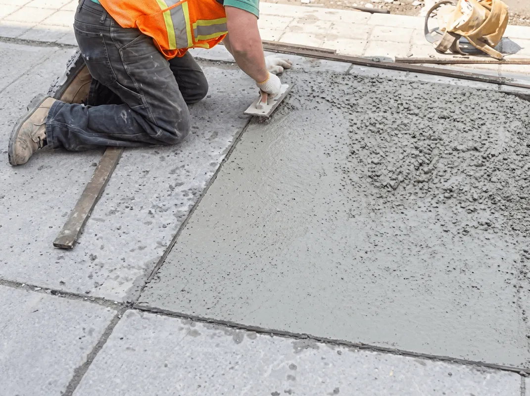 Professional repairing a concrete floor in Springfield, MO