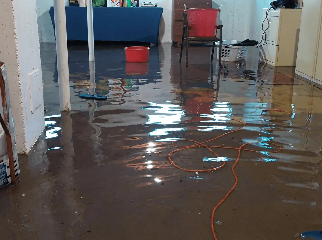 Basement with boiler, cabinets and washing machine completely flooded in Springfield, MO